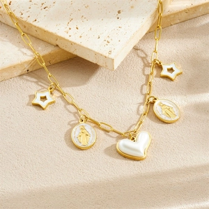 French vintage gold plated necklace with pearl, heart, and religious medal pendants