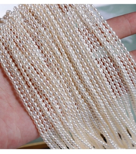 Close-up of 2.5mm natural white freshwater pearl beads strands for DIY jewelry making