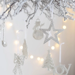 Silver glitter Christmas ornaments set featuring stars and JOY letters on snowy branches