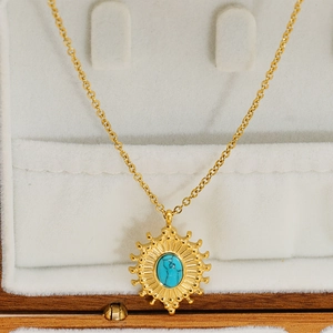 18k gold plated stainless steel necklace with sunburst oval blue turquoise pendant