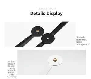 Detail showing smooth aluminum clock hands with copper sleeves and metallic texture