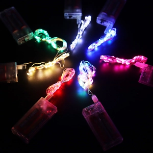 Detailed view of LED copper wire light strings with colorful battery boxes for balloons