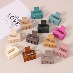Set of 12 large matte rectangle hair claw clips in assorted colors for styling hair