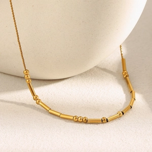 18K gold plated stainless steel bead and tube chain necklace with minimalist design