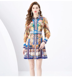 Close-up of vintage Baroque floral print dress with collared neck and blue buckled belt