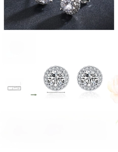 Macro shot of 925 silver halo earrings with zircon center and size chart detail