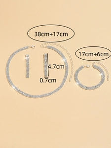Detail shot of silver bridal jewelry set with dimensions for necklace, bracelet and earrings