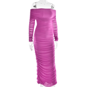 Detail view of the elegant ruched mesh texture on this rose red bodycon maxi dress