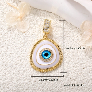 Detailed size and weight specs for gold evil eye pendant with cubic zirconia