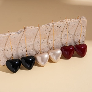 Vintage heart pearl drop earrings in black, champagne, and burgundy colors