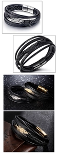 Detail of multi-layer leather bracelet featuring a feather pendant and magnetic metal clasp