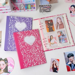 A5 six-hole loose-leaf photocard binder with heart pattern and elastic strap closure