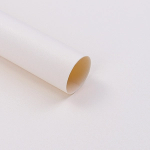 Close-up of a thick white paper tube for flower wrapping materials and posters