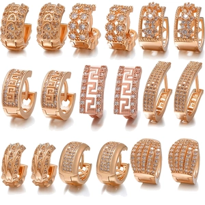 Nine pairs of rose gold hoop earrings with zircon heart and geometric leaf patterns