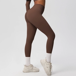 Detail view of high-waist chocolate brown yoga pants showing squat-proof fabric texture