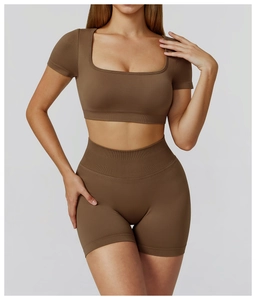 Detail of coffee brown seamless yoga set featuring ribbed high waist shorts and square neck top
