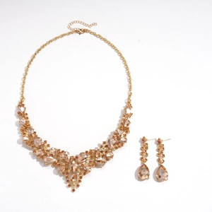 Vintage court style gold jewelry set with champagne waterdrop crystals and floral accents