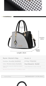Detail view of plaid tote bag with size dimensions 26x12x20cm and gold-tone hardware