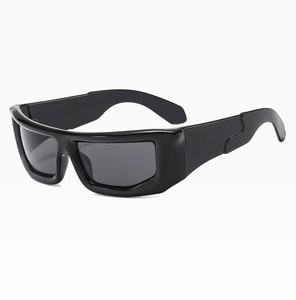 Side view of black Y2K wraparound sunglasses with futuristic frame and thick temples