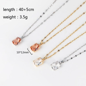 Detail showing cross necklace specs in gold and silver with zircon pendant dimensions