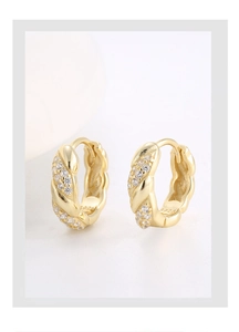 Close-up of S925 sterling silver hoop earrings with twisted gold texture and zircon stones