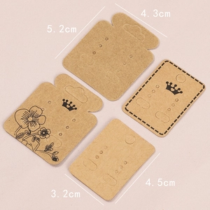 Kraft paper earring display cards with various crown and floral designs in four sizes