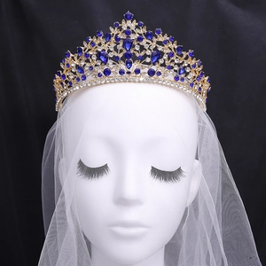 Luxurious baroque bridal crown with deep blue crystals and gold alloy base
