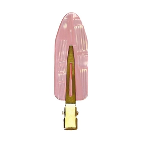 Pink seamless acrylic hair clips for women with gold metal grip on white background