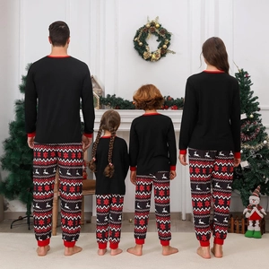 Christmas family pajama set with Santa print and reindeer snowflake pattern bottoms
