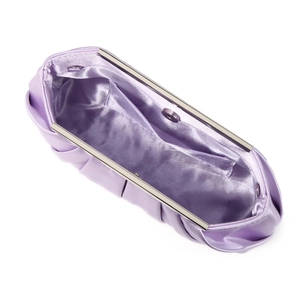 Detailed top view of purple satin evening bag with metal frame and internal lining