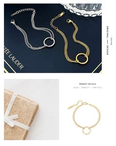 Detailed view of double-layer stainless steel bracelets with geometric ring in gold and silver