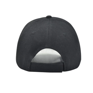 Macro detail of the adjustable strap and cotton twill texture on a black baseball cap