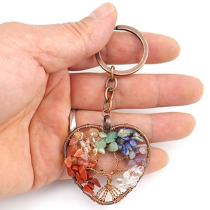 Handheld vintage copper heart Tree of Life keychain with colorful natural healing crystals