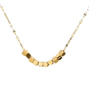 Minimalist gold cube bead necklace with stylish chain design on white background