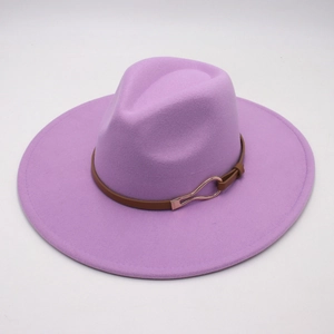 Detail of lilac wide brim felt hat featuring a brown leather band and gold metal buckle