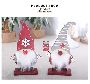 Detailed view of Nordic wooden Christmas gnomes with faux fur beards and snowflake patterns