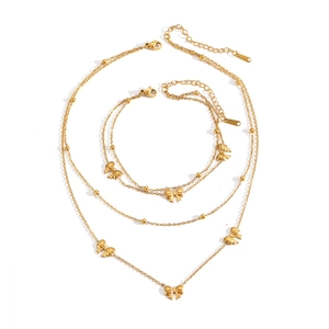 Elegante set di gioielli in acciaio inossidabile dorato con collana e bracciale a fiocco