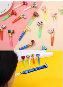 Close-up of colorful party blowouts with various patterns for birthday celebrations