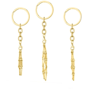 Three handmade golden crystal stone cage keychains with woven mesh holders and chains