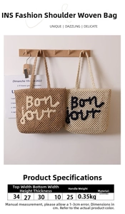 Detail of woven straw shoulder bag with Bonjour embroidery in brown and beige tones