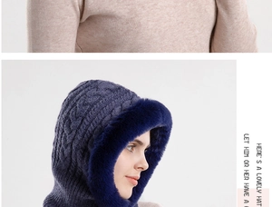 Detail of navy knit winter hood with thick cable pattern and faux fur trim for warmth