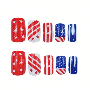 Macro view of 10-piece US flag theme press-on nails with stars and stripes pattern