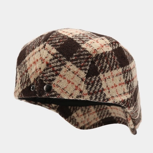 Vintage checkered wool newsboy cap in brown and beige with stylish side button detail