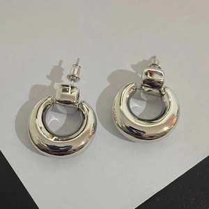 Minimalist silver chunky dome hoop earrings with a polished mirror finish for women