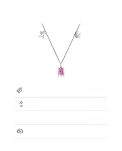 Detail of S925 silver necklace featuring a pink teardrop gem and Gemini symbol charm