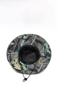 Macro detail of breathable mesh lining and adjustable chin strap on camo sun hat