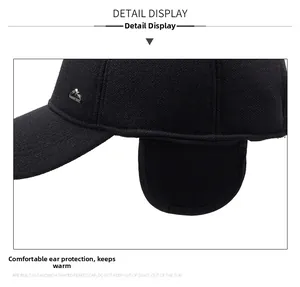 Detailed close-up of winter baseball cap featuring folding ear flaps and wool fabric