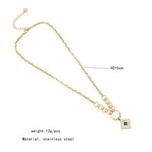 Detail view of a 40cm stainless steel gold square necklace with green gemstone and dimensions