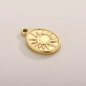 Vintage stainless steel oval pendant with sun and moon engraving in gold finish