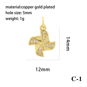 Detail showing 14mm sunflower pendant dimensions in gold plated copper and zircon